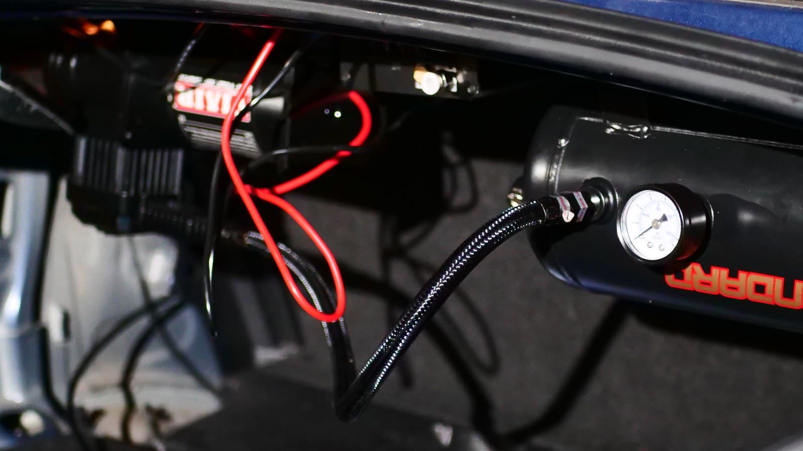 Air suspension tank and compressor in a Toyota 86 boot