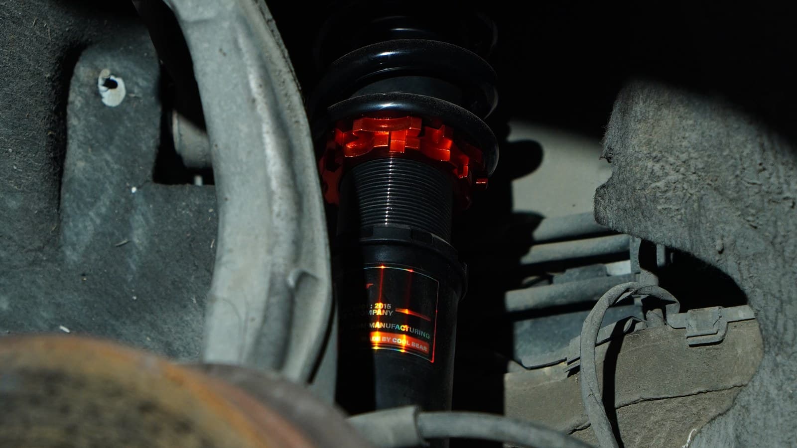 Coilover installed in a wheel well at BVT