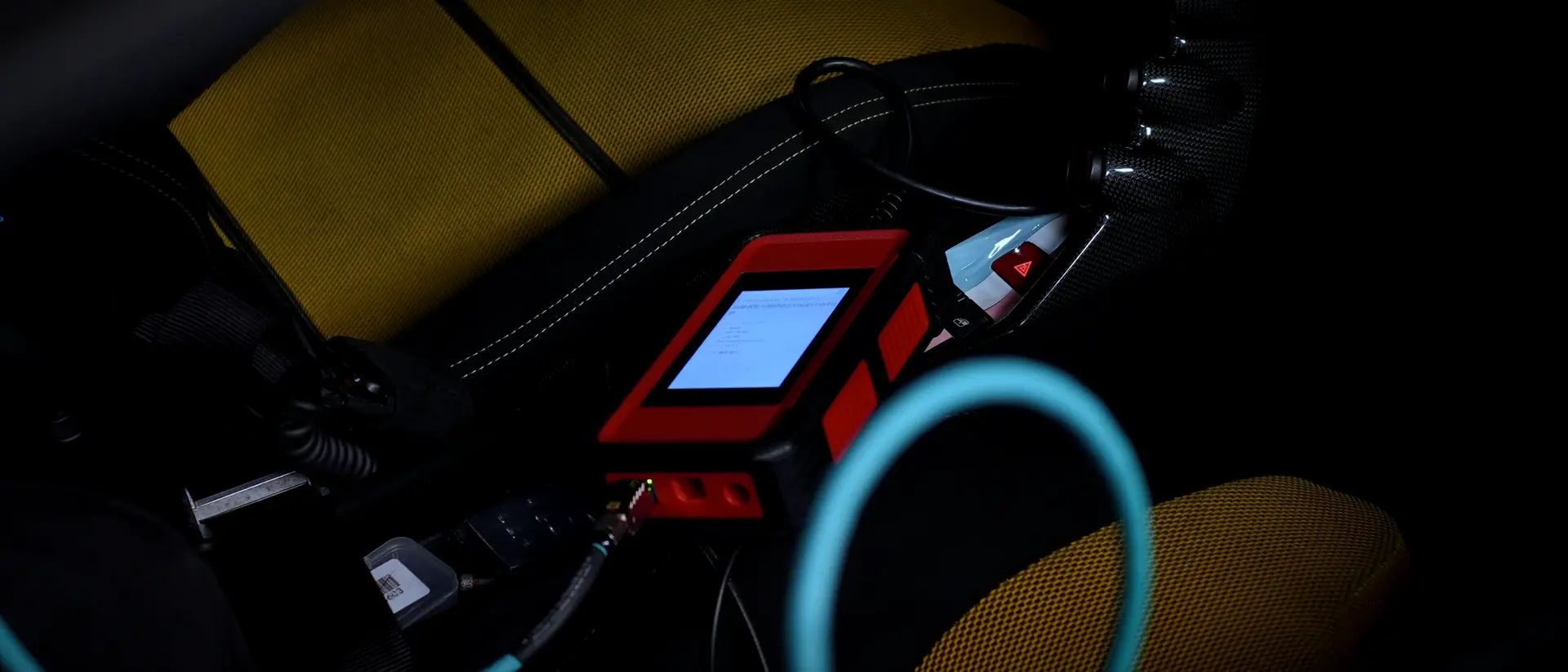 Diagnostic scan tool plugged into a Ferrari 458 Speciale at BVT Tuning