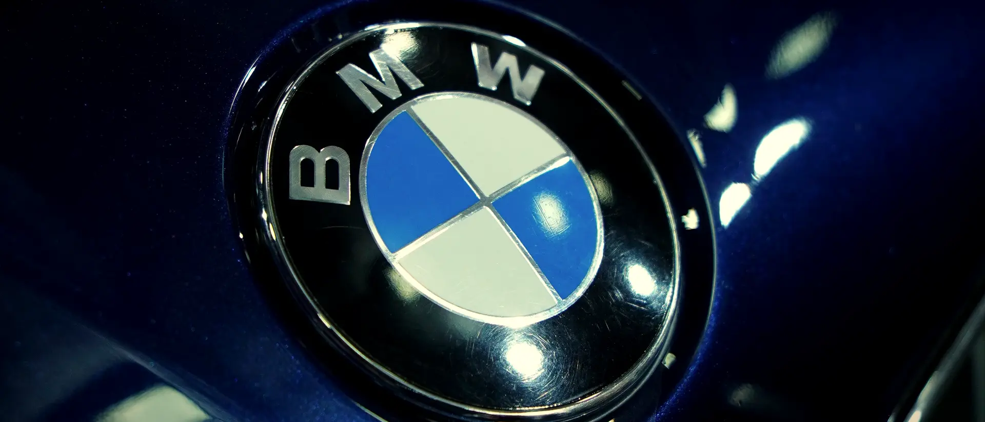 Deep gloss on a BMW Z4 bonnet roundel after paint protection at BVT Tuning