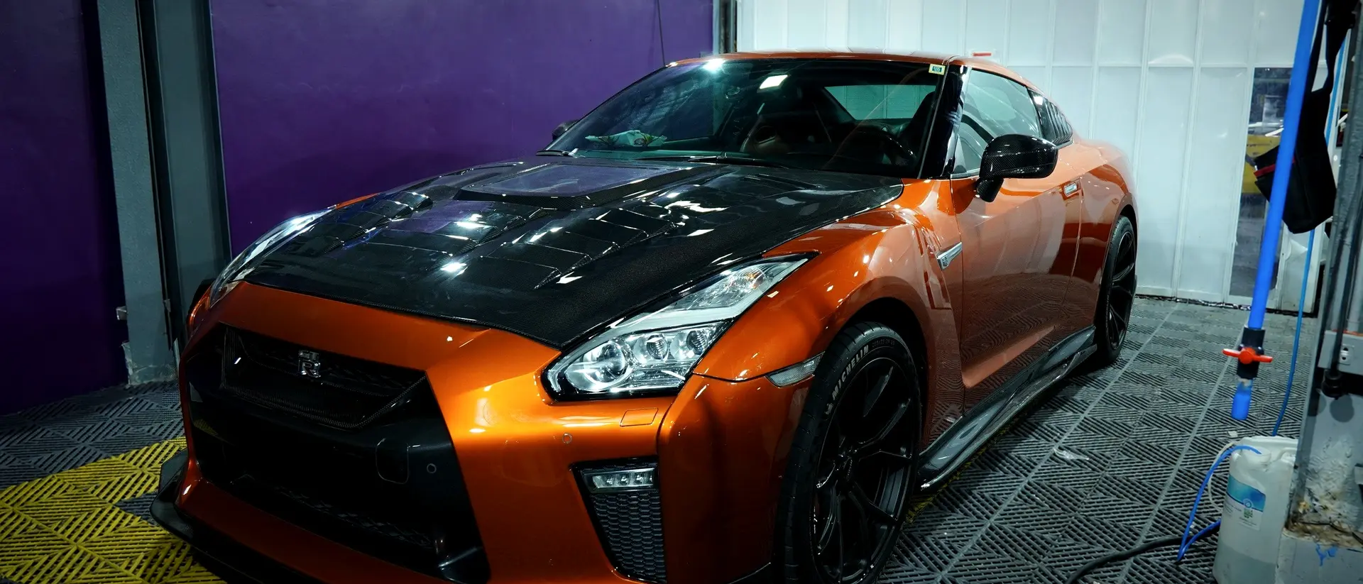 Nissan GT-R with orange accents after PPF install at BVT Tuning